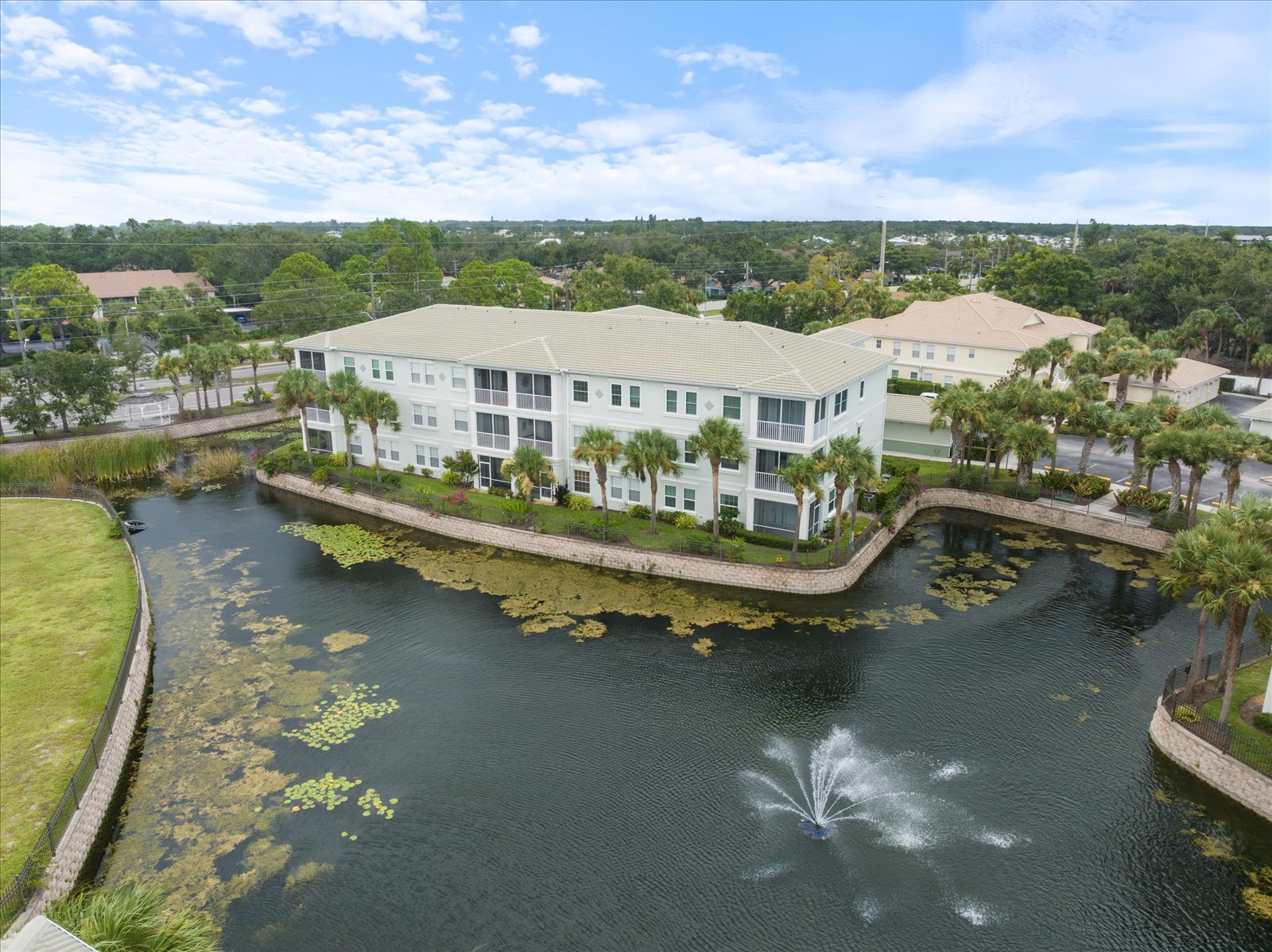Aerial View Of Condo Building By Pond In Venice, Fl Aerial View Of Condo Building By Pond In Venice, Fl