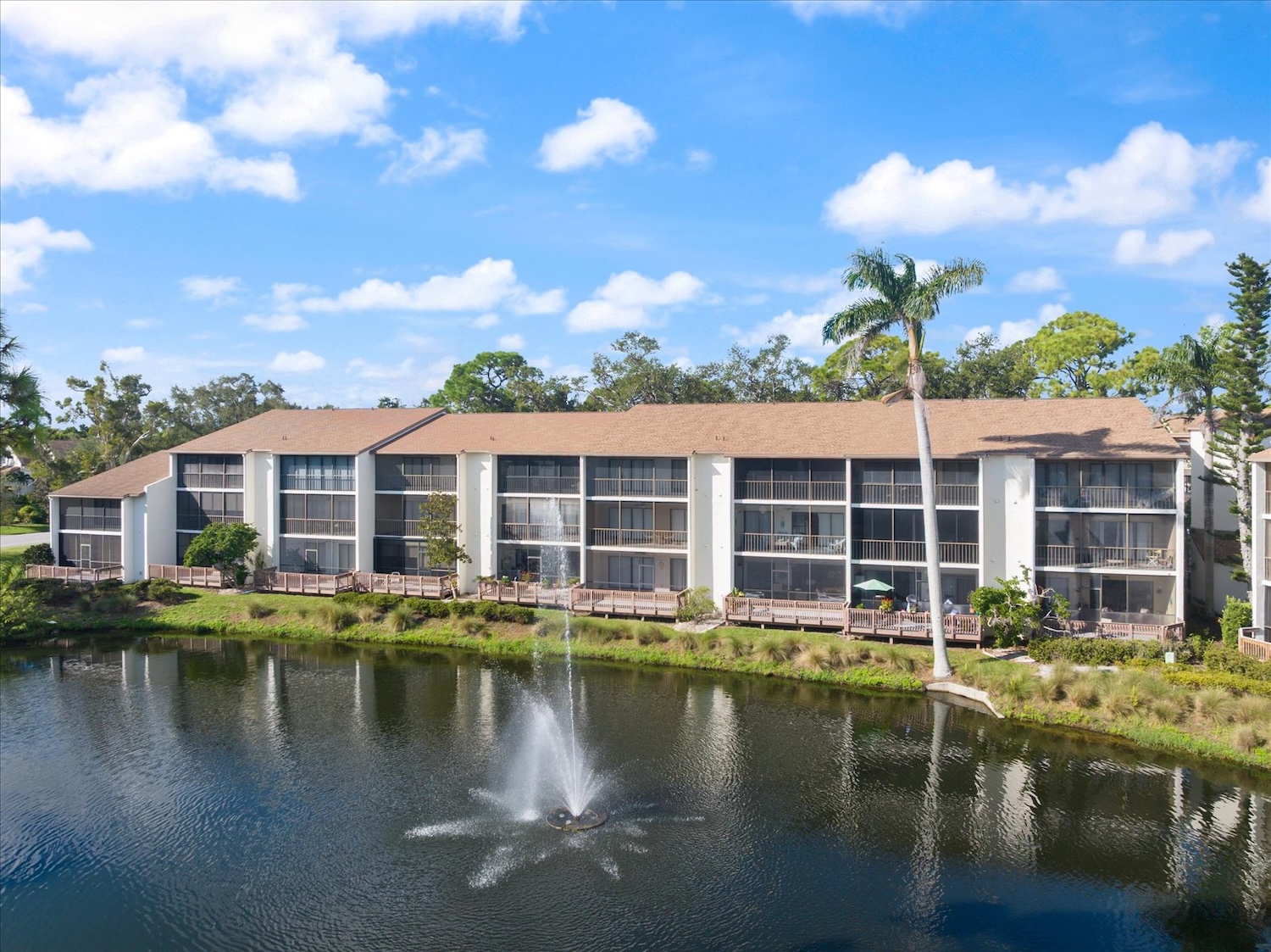 Condos In Venice, Florida With Palm Tree And Pond Condos In Venice, Florida With Palm Tree And Pond