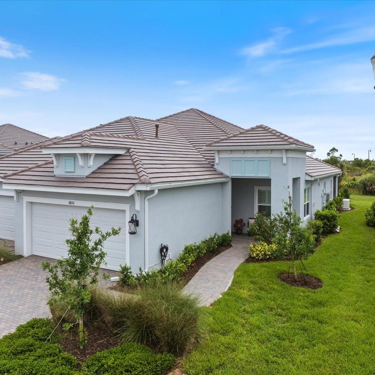 Light Blue 1 Story Home With Pretty Landscaping Near Venice, Florida Light Blue 1 Story Home With Pretty Landscaping Near Venice, Florida
